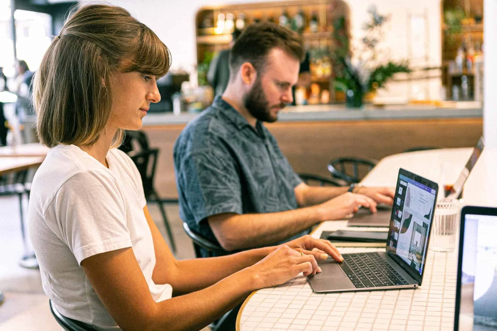 People working together at a shared workspace